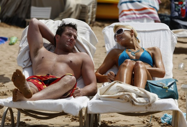 Paris Hilton takes a beach break with her new man