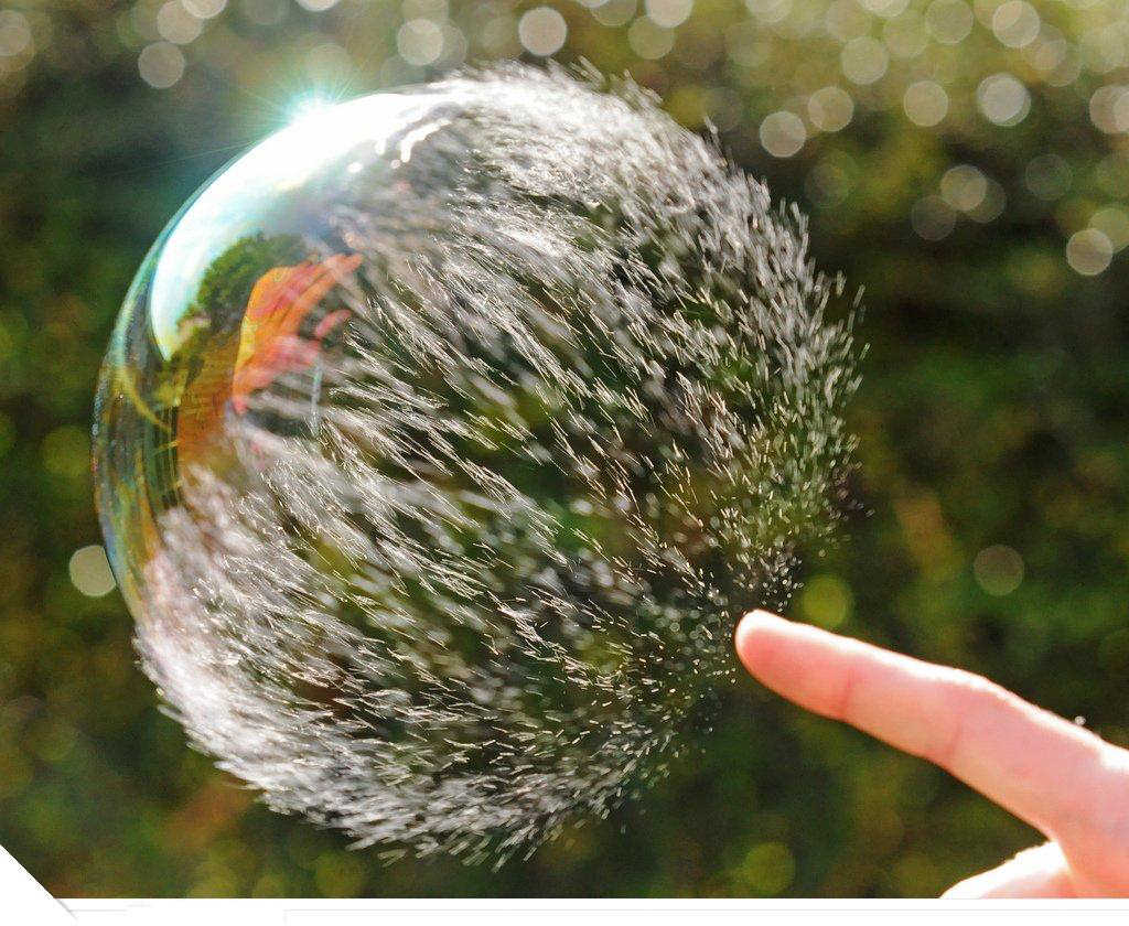 http://img.xcitefun.net/users/2009/07/96733,xcitefun-amazing-photography-of-a-bubble-bursting-6.jpg