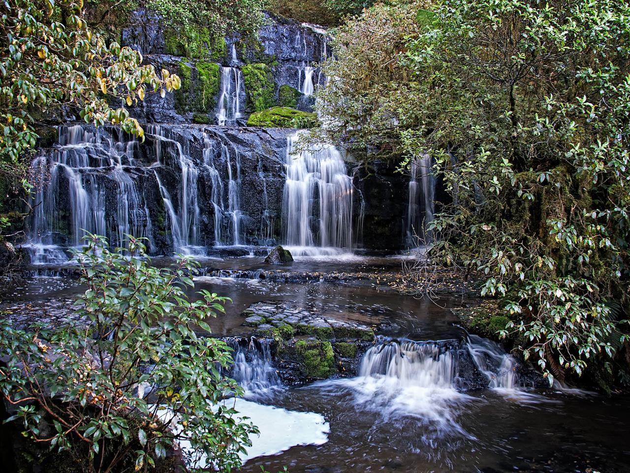 Purakaunui Falls Cascading Waterfall of New Zealand Purakaunui Falls Cascading Waterfall of New Zealand