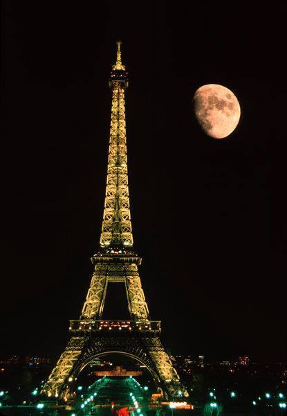 Moon Over The Eiffel Tower - XciteFun.net